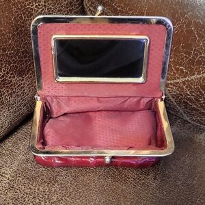 Elegant Red Clutch with Mirror